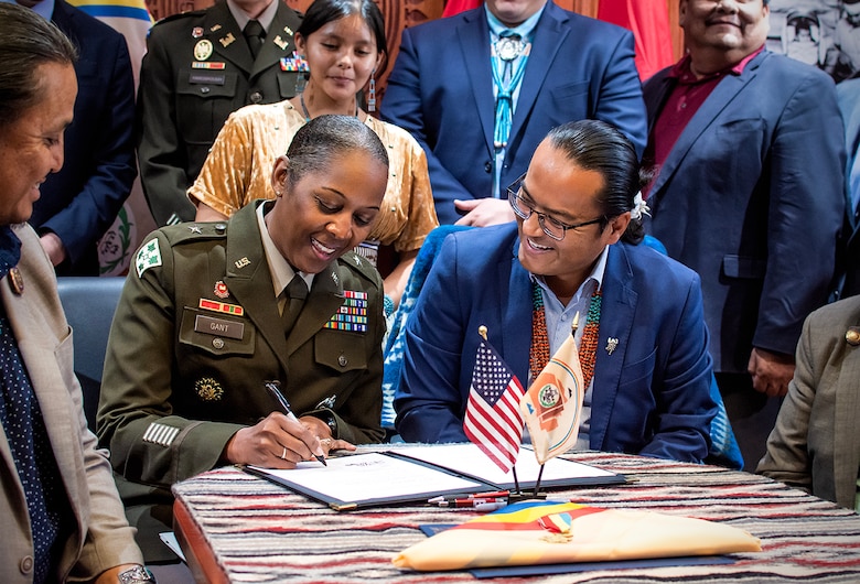 U.S. Army Brig. Gen. Antoinette Gant (left), commanding general, USACE-South Pacific Division, and Navajo Nation President Buu Nygren sign an agreement intended to improve USACE’s support to Navajo Nation at Window Rock, Arizona, July 6. (U.S. Army photo by Justin Graff, USACE-Albuquerque District Public Affairs)