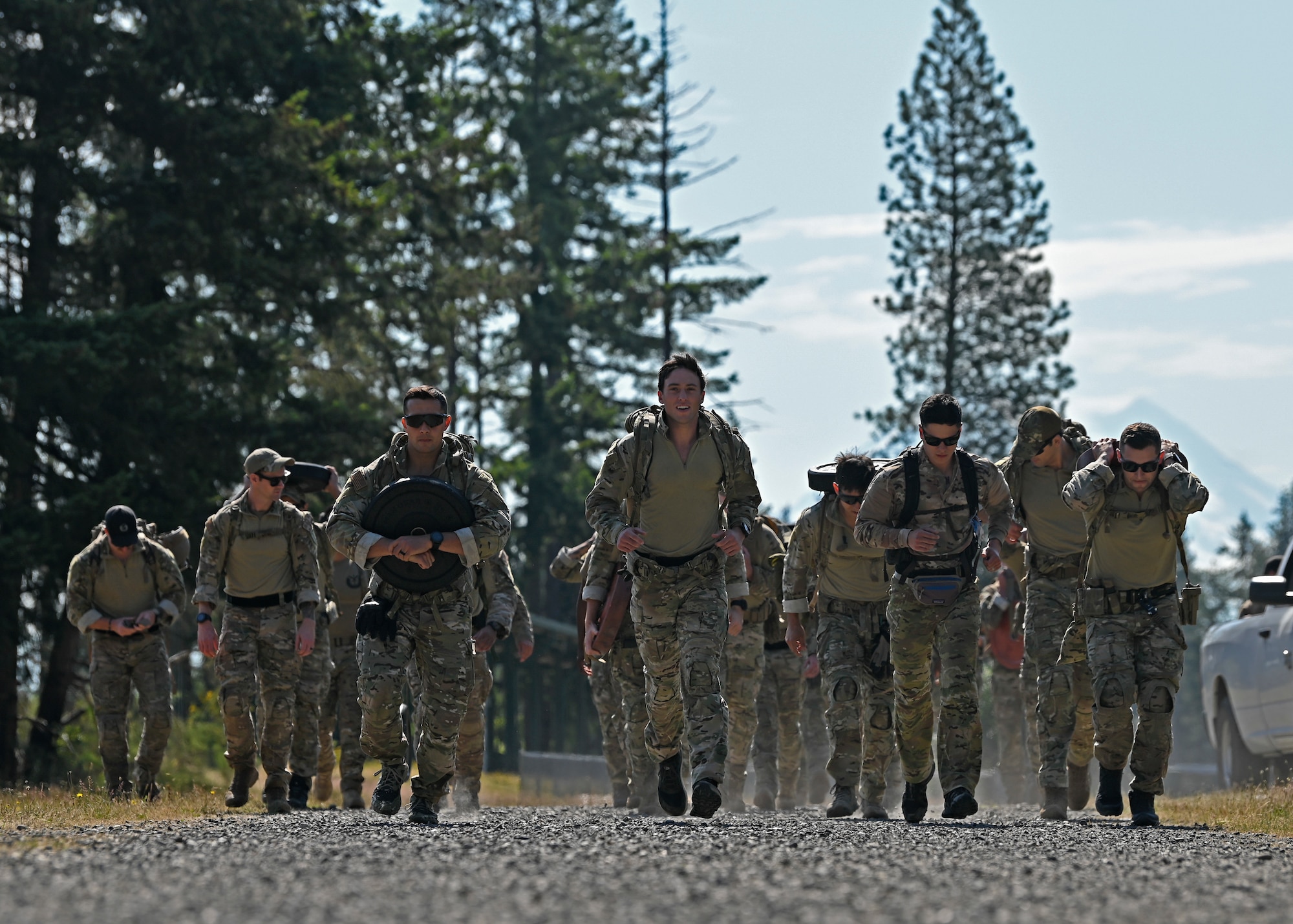 U.S. Air Force tactical air control party Airmen and special warfare mission support Airmen with the 5th Air Support Operations Squadron, participate in a three and a half mile run during the Lowlife Challenge at Joint Base Lewis-McChord, Washington, June 22, 2023. The top two teams from the Lowlife Challenge will go on to represent the 5th ASOS at the group level TACP competition, Chaos Challenge. (U.S. Air Force photo by Senior Airman Callie Norton)