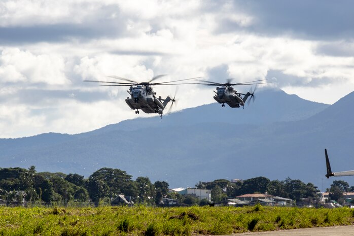 U.S. Marine Corps CH-53E Super Stallions attached to Marine Medium Tiltrotor Squadron 163 (Reinforced), Marine Aircraft Group 16, 3rd Marine Aircraft Wing, make a final approach to Antonio Bautista Air Base as part of
Marine Aviation Support Activity 23 in Puerto Princesa, Palawan, Philippines, July 6, 2023. MASA is a bilateral exercise between the Armed Forces of the Philippines and the U.S. Marine Corps, aimed at enhancing interoperability and coordination focused on aviation-related capabilities. During MASA 23, Filipino and U.S. Marines conduct approximately twenty different training evolutions, including live-fire, air assaults, and subject matter expert exchanges across aviation, ground, and logistics capabilities.