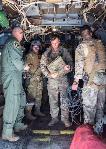 Maj. Kyle Konkolics, 71st Special Operations Squadron safety chief, conducts a pre-flight safety check May 10, 2023, at Kirtland Air Force Base, N.M. Konkolics received the Distinguished Flying Cross for his heroic role in a rescue mission of an American hostage in Africa in October 2020. The successful operation was the longest-distance hostage rescue conducted during night in Department of Defense history and was completed within 48 hours of their initial notification. (U.S. Air Force photo by Allen Winston)