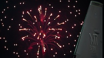 A B52-H Stratofortress assigned to the 23rd Bomb Squadron sits on the main parking apron during a firework display on Minot Air Force Base, North Dakota, June 30, 2023. The tail fin of the B52-H helps identify the squadron and home base that operates the jet. (U.S. Air Force photo by Airman 1st Class Alexander Nottingham)