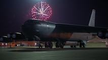 A B52-H Stratofortress assigned to the 23rd Bomb Squadron sits on the main parking apron during a firework display at Minot Air Force Base, North Dakota, June 30, 2023. The firework show was the final event for Freedom Fest put on by the 5th Force Support Squadron celebrating freedom. (U.S. Air Force photo by Airman 1st Class Alexander Nottingham)