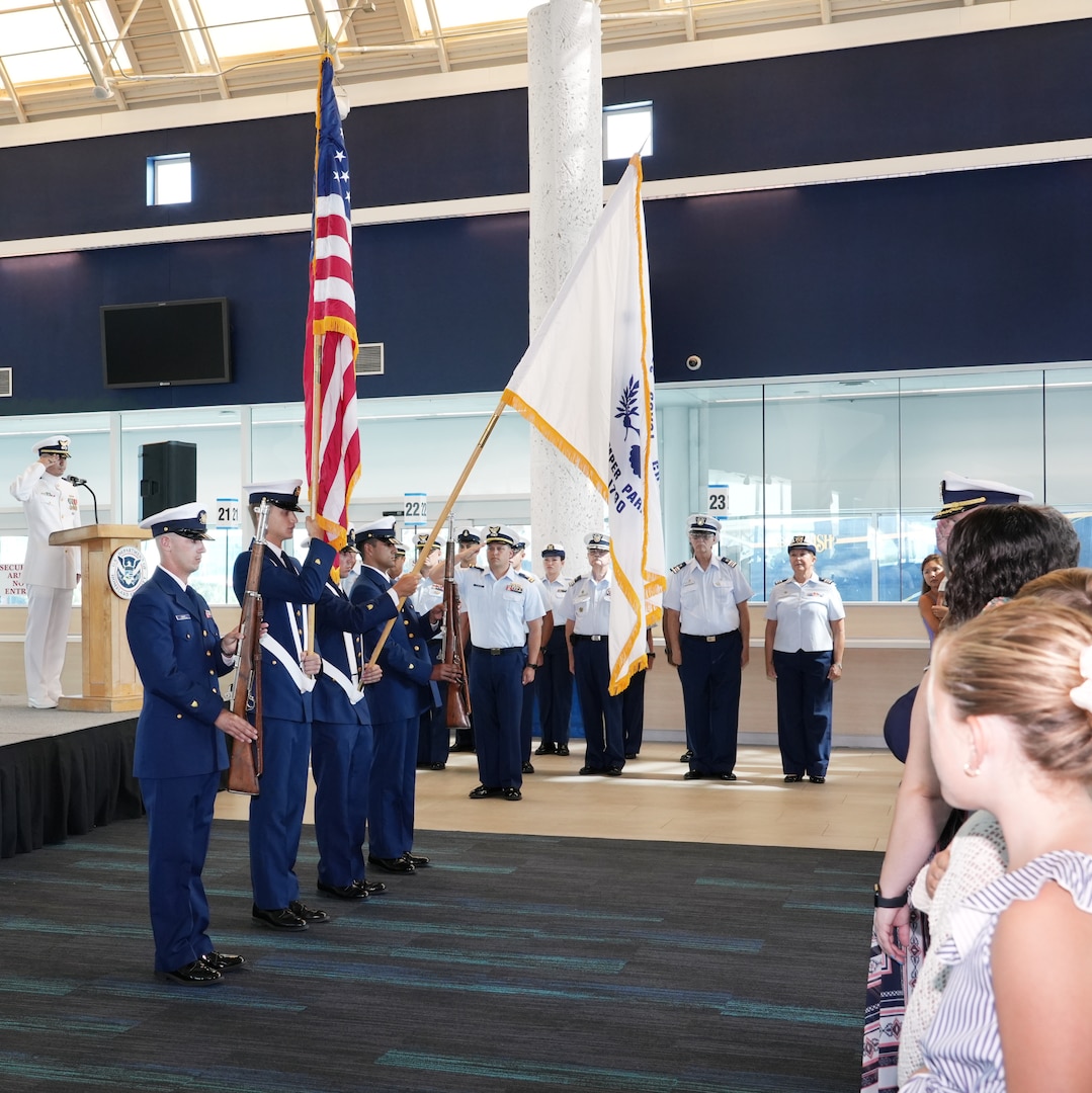 A Coast Guard Sector Jacksonville color guard team conducts a change of command ceremony at Port Canaveral, Florida, July 7, 2023. The Marine Safety Unit Port Canaveral was previously a Marine Safety Detachment under Coast Guard Sector Jacksonville until it became an MSU on May 12, 2023. (U.S. Coast Guard photo by Coast Guard Auxiliary member Jill Bazeley)