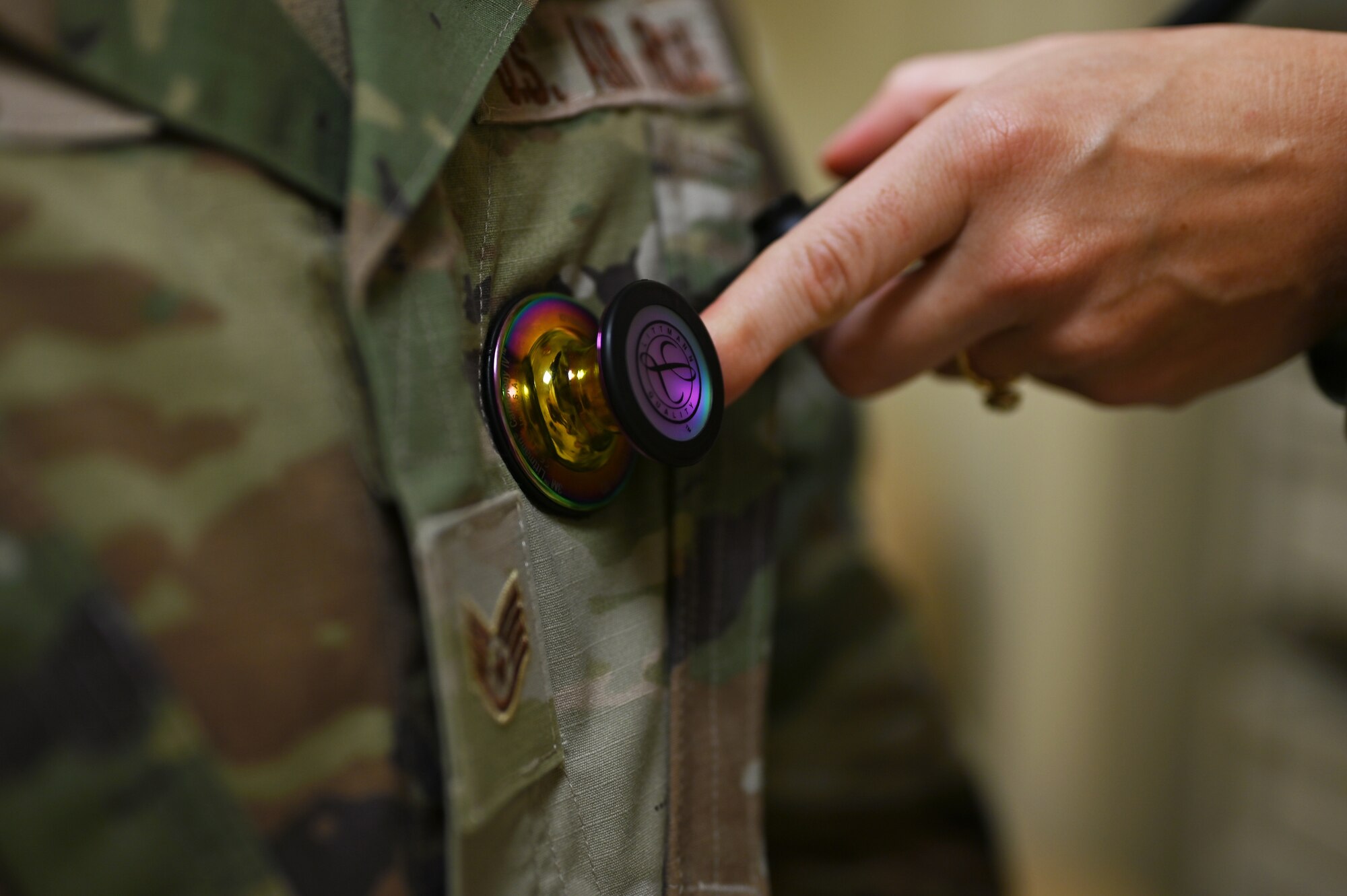 U.S. Air Force 1st Lt. Sarah Hirsch, a physician assistant with the 62d Medical Squadron, checks a patient's heartbeat with a stethoscope at the Warrior Operational Medicine Clinic at Joint Base Lewis-McChord, Washington, July 6, 2023. Hirsch received recognition from her peers for her continuous positive outlook, ability to foster unit cohesiveness and for developing a crossfit training program for the 62d Aerial Port Squadron. (U.S. Air Force photo by Senior Airman Colleen Anthony)