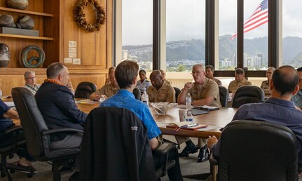 Hawaii State Gov. Josh Green (left), listens to Joint Task Force-Red Hill (JTF-RH) Commander, U.S. Navy Vice Adm. John Wade (right), during a discussion with the Governor’s Water Council (GWC) at the Hawaii State Capitol, Honolulu, Hawaii, July 7, 2023.