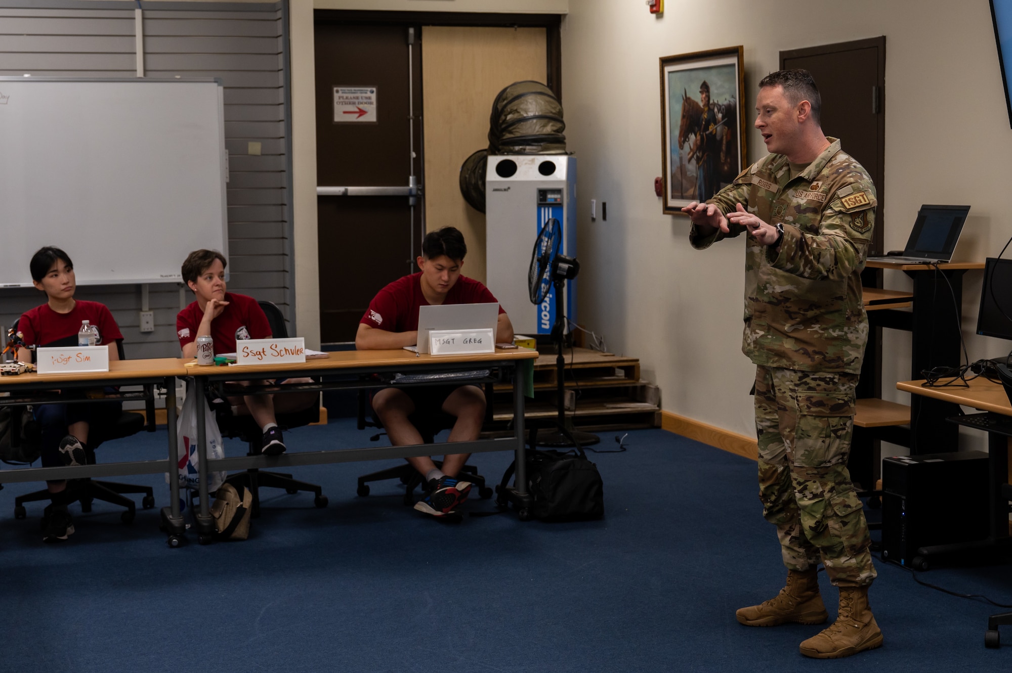 Master Sgt. Christopher Rogers, 8th Force Support Squadron first sergeant, speaks with Class 23-B during Airmen Leadership School mentorship time at Kunsan Air Base
