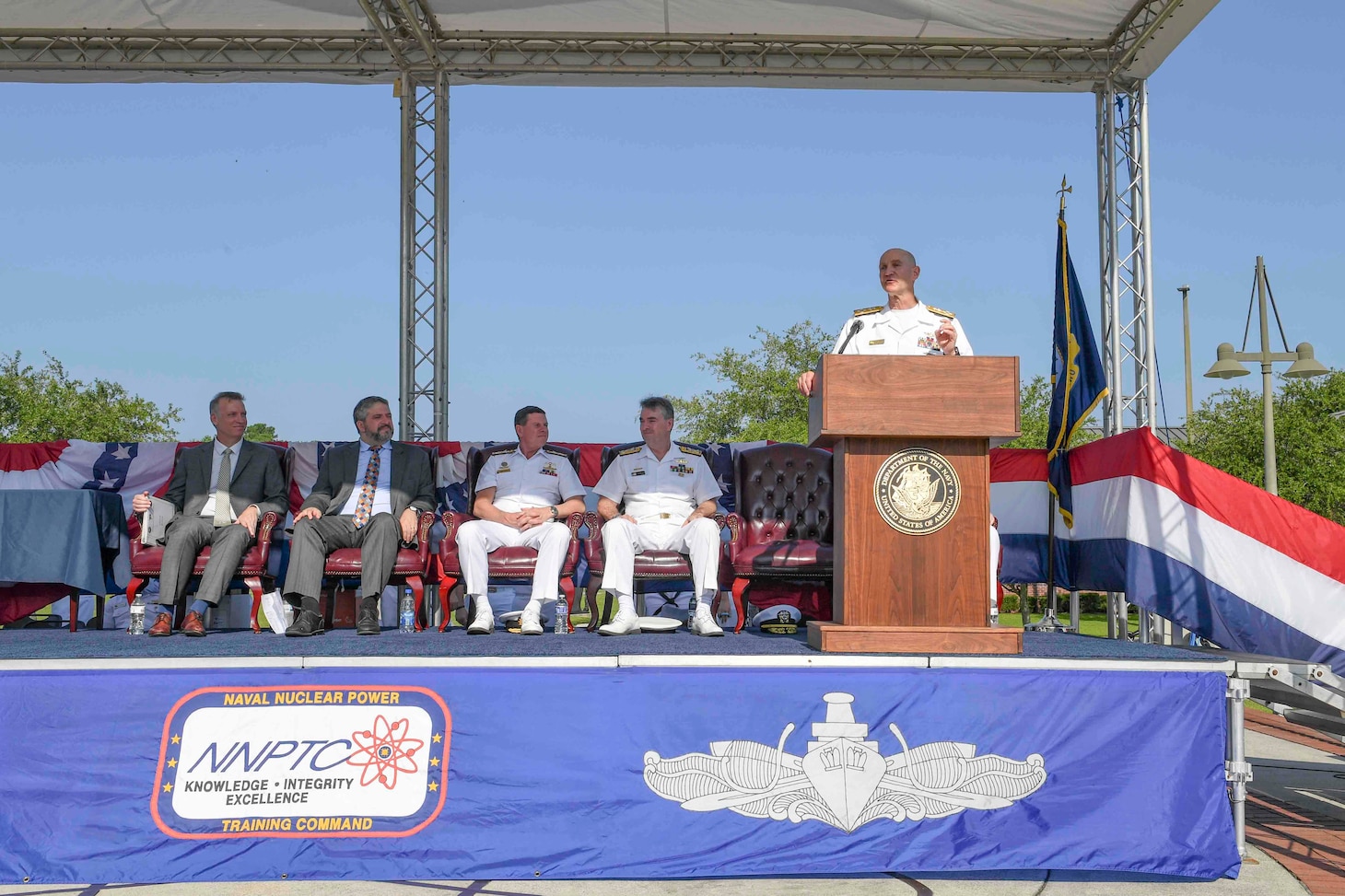 Adm. James F. Caldwell Jr., director, Naval Nuclear Propulsion Program, speaks during a United States Naval Nuclear Power School (NPS) graduation ceremony at Naval Nuclear Power Training Command (NNPTC), July 7, 2023. Three Royal Australian Navy (RAN) officers graduated NPS, marking a significant step in Australia's goal to operate conventionally-armed, nuclear-powered attack submarines (SSNs). (U.S. Navy photo by Mass Communication Specialist 1st Class William Phillips/RELEASED)