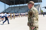 Chief Master Sgt. Michael Morgan listens to a briefing at the DLIELC Aviation Language Training Center at JBSA-Lackland, Texas.