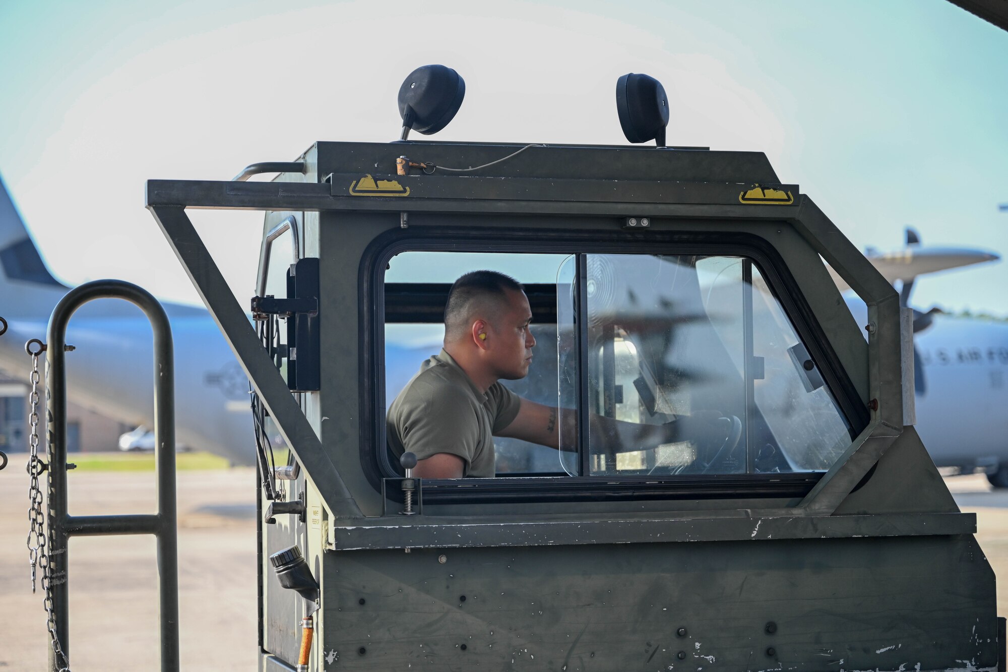 Airmen load onto a C-130J Super Hercules to head to an exercise