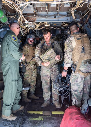 Maj. Kyle Konkolics, 71st Special Operations Squadron safety chief, conducts a pre-flight safety check May 10, 2023, at Kirtland Air Force Base, N.M. Konkolics received the Distinguished Flying Cross for his heroic role in a rescue mission of an American hostage in Africa in October 2020. The successful operation was the longest-distance hostage rescue conducted during night in Department of Defense history and was completed within 48 hours of their initial notification. (U.S. Air Force photo by Allen Winston)