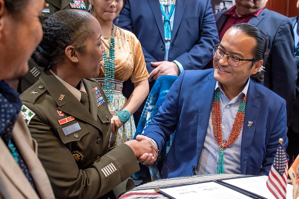 Navajo Nation President Buu Nygren (right) and U.S. Army Brig. Gen. Antoinette Gant, commanding general, USACE-South Pacific Division, shake hands after signing an agreement intended to improve USACE’s support to Navajo Nation at Window Rock, Arizona, July 6. (U.S. Army photo by Justin Graff, USACE-Albuquerque District Public Affairs)