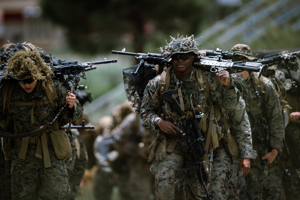 U.S. Marines with weapons Company, 2nd Battalion, 23rd Marine Regiment, 4th Marine Division, hike during Mountain Exercise (MTX) 4-23