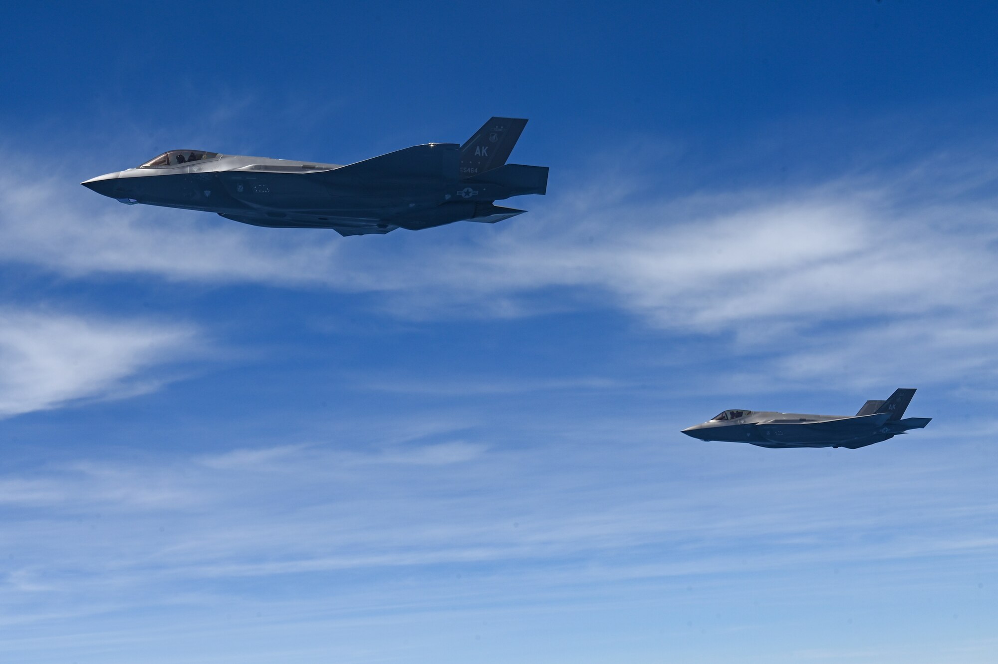 Aircraft fly together.