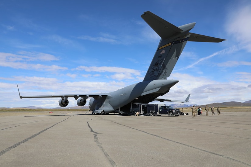 An Alaska National Guard 103rd Civil Support Team reconnaissance vehicle is unloaded from a C-17 Globemaster III from the 144th Airlift Squadron, 176th Wing, in Nome, Alaska, June 12, during exercise ORCA 2023. The aircraft deployed members of the Alaska National Guard’s 103rd Weapons of Mass Destruction - Civil Support Team as part of the interagency, comprehensive disaster drill taking place in Nome, Kotzebue, Anchorage and the Matanuska-Susitna Borough, June 12-15, 2023.