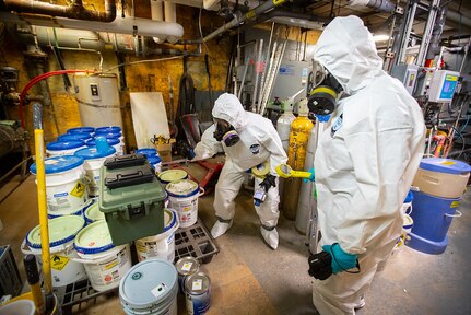 Team members with the Washington National Guard’s 10th Weapons of Mass Destruction - Civil Support Team, work through an emergency scenario consisting of a simulated radiological weapon that could be used in the manufacture of a dirty bomb on the University of Alaska Anchorage campus June 13, 2023. The emergency response training is part of ORCA 2023, a biennial exercise designed to maintain readiness, validate response procedures, and collaborate with first response agencies across the state.