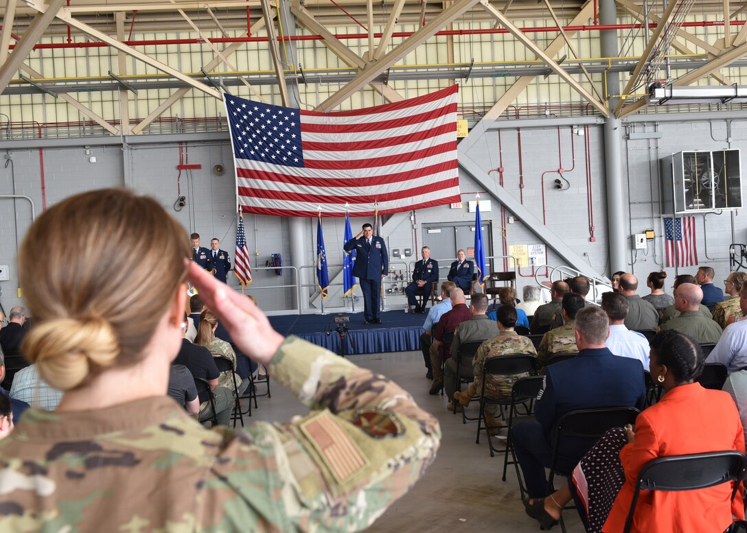 Col. Joseph Contino (center stage), 914th Air Refueling Wing commander, renders a first salute to the wing during a change of command ceremony July 7, 2023 at Niagara Falls Air Reserve Station, New York.