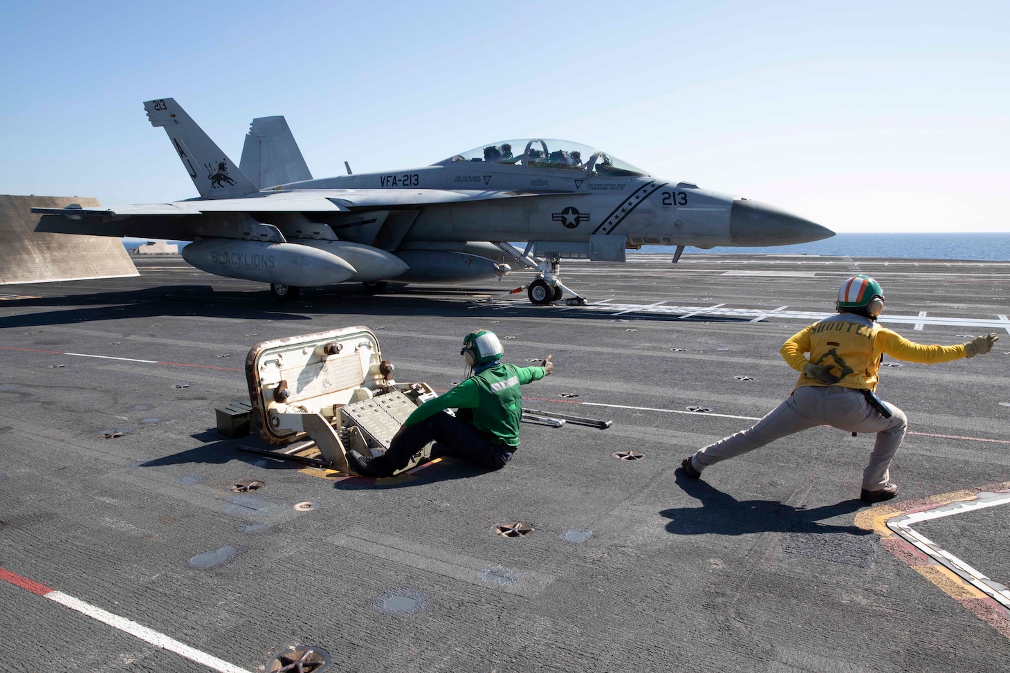 An F/A-18F Super Hornet, attached to the "Blacklions" of Strike Fighter Squadron (VFA) 213 prepares to launch from the flight deck of the world’s largest aircraft carrier USS Gerald R. Ford (CVN 78) in the Adriatic Sea, July, 8, 2023. Gerald R. Ford is the U.S. Navy's newest and most advanced aircraft carrier, representing a generational leap in the U.S. Navy's capacity to project power on a global scale. The Gerald R. Ford Carrier Strike Group is on a scheduled deployment in the U.S. Naval Forces Europe area of operations, employed by U.S. Sixth Fleet to defend U.S., allied, and partner interests. (U.S. Navy photo by Mass Communication Specialist 1st Class William Spears)