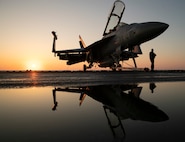 An E/A-18G attached to the "Grey Wolves" of Electronic Attack Squadron (VAQ) 142, sits chocked and chained to the flight deck of the world's largest aircraft carrier USS Gerald R. Ford (CVN 78), July 9, 2023. VAQ-142 is deployed aboard Gerald R. Ford as part of Carrier Air Wing (CVW) 8. USS Gerald R. Ford is the U.S. Navy's newest and most advanced aircraft carrier, representing a generational leap in the U.S. Navy's capacity to project power on a global scale. The Gerald R. Ford Carrier Strike Group is on a scheduled deployment in the U.S. Naval Forces Europe area of operations, employed by U.S. Sixth Fleet to defend U.S., allied, and partner interests. (U.S. Navy photo by Mass Communication Specialist 2nd Class Jackson Adkins)