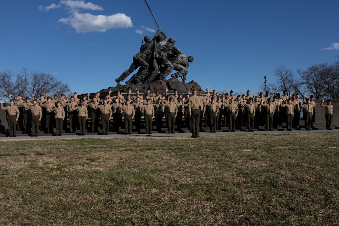 U.S. Marine Corps Gen. Eric M. Smith, Assistant Commandant of the Marine Corps, swears in Marines at the Marine Corps War Memorial in Arlington, Va. on Feb. 23, 2023. U.S. Marines from 2nd Marine Logistics Group participated in a reenlistment ceremony on the 78th anniversary flag raising atop Mount Suribachi, during the Battle for Iwo Jima. (U.S. Marine Corps photo by Lance Cpl. Alfonso Livrieri)
