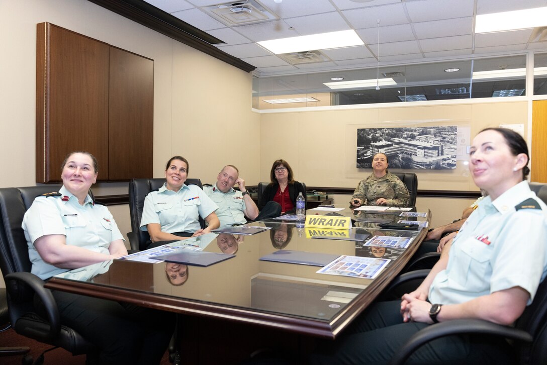 Members of the Canadian Delegation receive a general brief of the WRAIR mission.