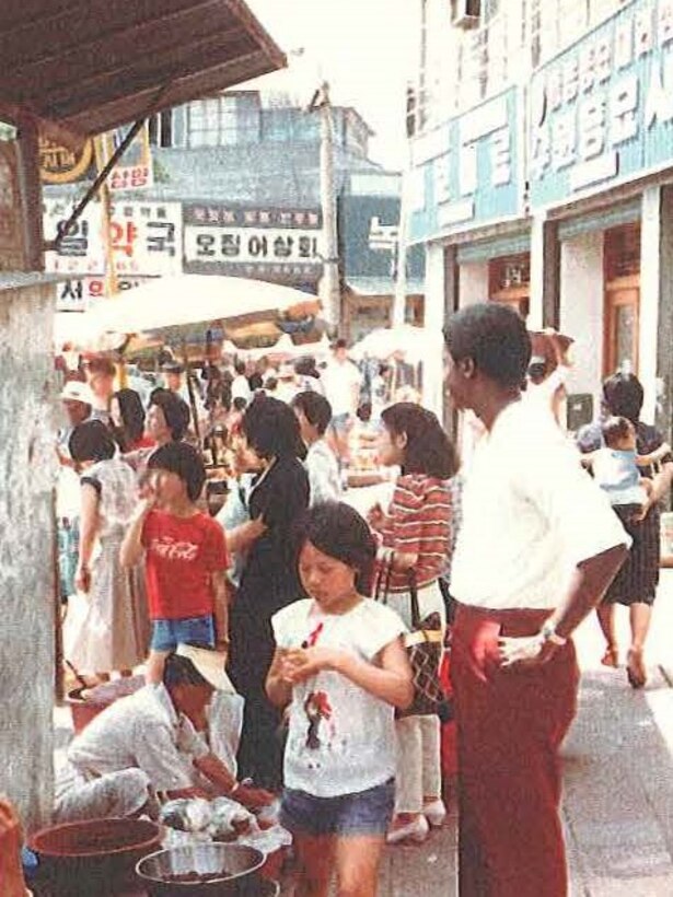 A young Lt. Michael Flynn takes a walk through the local downtown food market in Pyeongtaek.