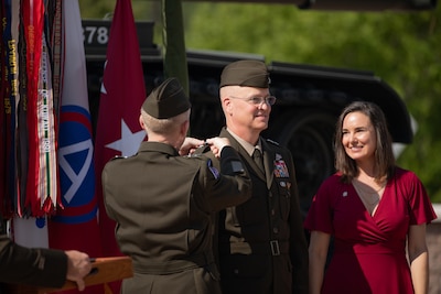 Lt. Gen. Patrick Frank, U.S. Army Central commanding general, promotes Maj. Gen. Henry S. Dixon, U.S. Army Central's Deputy Commanding General, at a ceremony at Shaw Air Force Base, S.C., July 07, 2023. Maj. Gen. Dixon’s spouse, MaryPat, watches as her husband receives his second star. Dixon was promoted to the rank of major general during the ceremony.