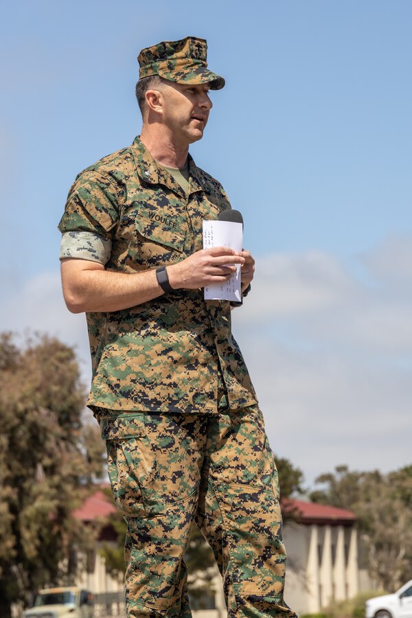 U.S. Marine Corps Lt. Col. James Woulfe, the outgoing commanding officer for Headquarters and Support Battalion, School of Infantry West, Marine Corps Base Camp Pendleton, delivers remarks during a change of command ceremony at the SOI-West parade deck on Camp Pendleton, June 29, 2023. H&S Bn., SOI-West provides the operational, administrative, logistical, and legal services necessary to support the School of Infantry's training units.  (U.S. Marine Corps photo by Lance Cpl. Mhecaela J. Watts)