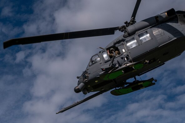 An Alaska National Guard HH-60M Black Hawk helicopter from Golf Company, 2-211th General Support Aviation Battalion, conducts a training mission May 31, 2023, near Colony Glacier.