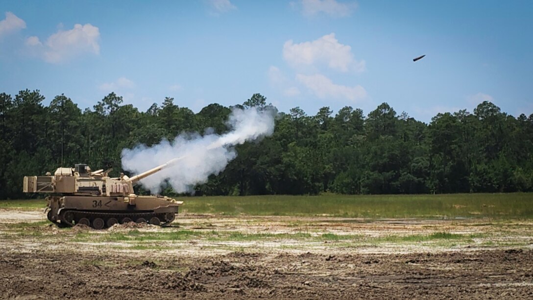 Soldiers assigned to the "Axehandles," 1-113th Field Artillery Battalion, 30th Armored Brigade Combat Team (ABCT), fire the M109A7 Paladin Howitzer as part of the eXportable Combat Training Capability exercise at Fort Stewart, June 24, 2023.