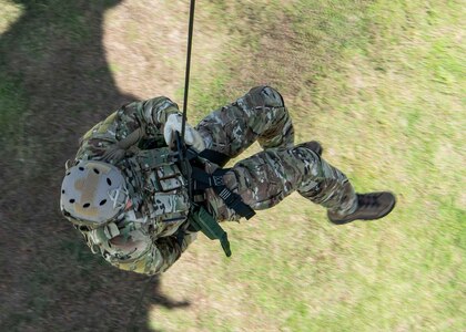 A Sailor assigned to Task Group 75.1/ Explosive Ordnance Disposal Mobile Unit (EODMU) 5 repels from a MH-60S Sea Hawk helicopter from Helicopter Sea Combat Squadron (HSC) 21, during a training evolution on CTG 75.1/EODMU 5’s compound. Part of Destroyer Squadron Seven, HSC-21 is assigned to Independence-variant littoral combat ship USS Tulsa (LCS 16), on a rotational deployment operating in the U.S. 7th fleet area of operations to enhance interoperability with partners and serve as a ready-response force in support of a free and open Indo-Pacific region. (U.S. Navy photo by Mass Communication Specialist 2nd Class Colby Mothershead)