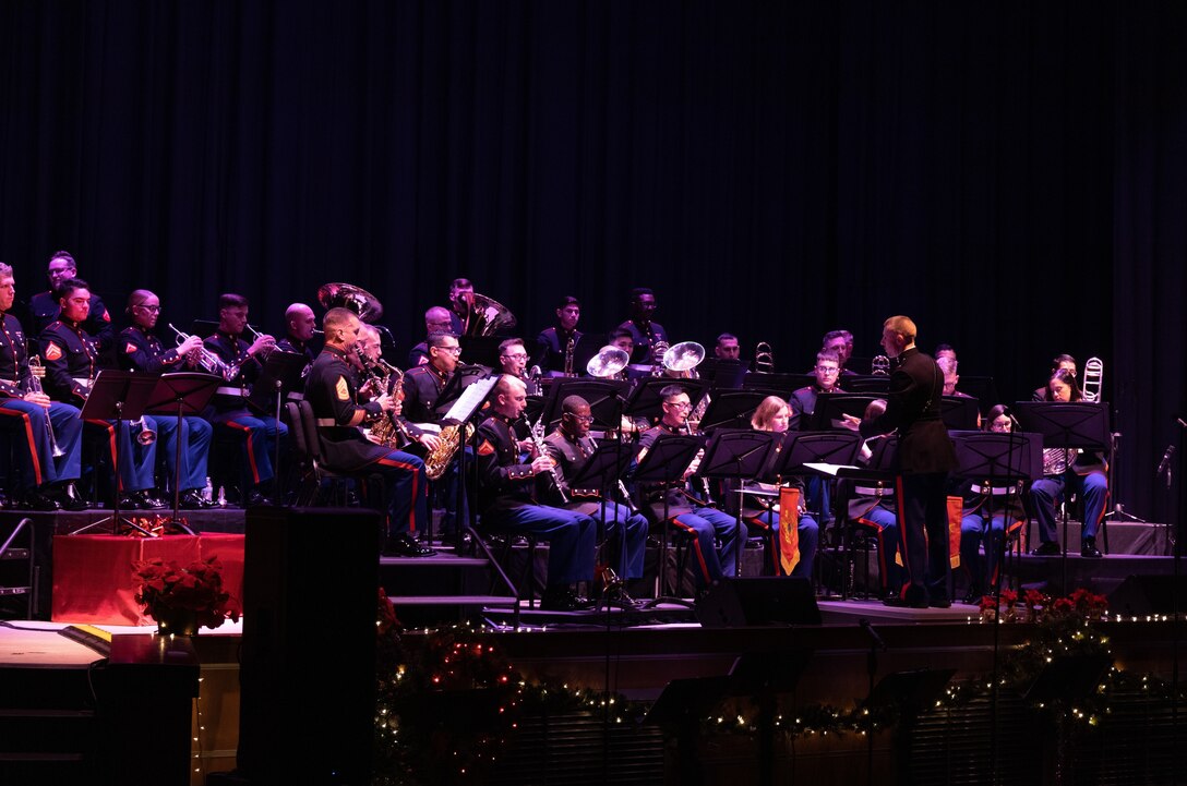 U.S. Marines with 2nd Marine Aircraft Wing (MAW) Band play music during a Christmas concert at Marine Corps Air Station Cherry Point, North Carolina, Dec. 9, 2022. The event was open to the public and was 2nd MAW Band’s first Christmas concert since 2019 due to COVID-19 restrictions. 2nd MAW is the aviation combat element of II Marine Expeditionary Force. (U.S. Marine Corps photo by Staff Sgt. Theodore Bergan)