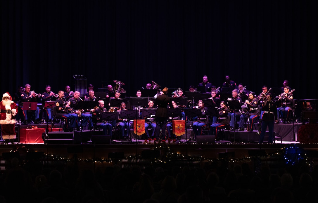 U.S. Marines with 2nd Marine Aircraft Wing (MAW) Band play music during a Christmas concert at Marine Corps Air Station Cherry Point, North Carolina, Dec. 9, 2022. The event was open to the public and was 2nd MAW Band’s first Christmas concert since 2019 due to COVID-19 restrictions. 2nd MAW is the aviation combat element of II Marine Expeditionary Force. (U.S. Marine Corps photo by Staff Sgt. Theodore Bergan)