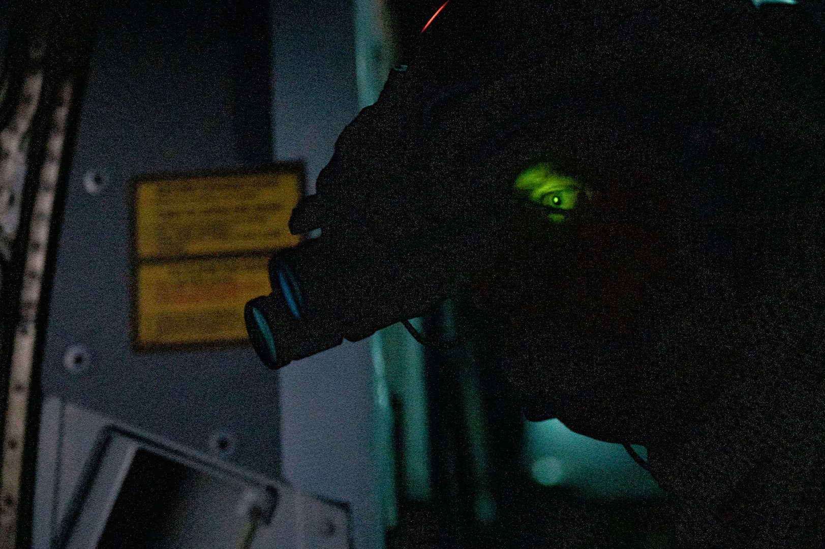 A French Air and Space Force A400M Loadmaster assigned to the 1/61 “Touraine” Transportation Squadron scans the ocean with NVG looking for a lost ship during a search and rescue operation in the Pacific Ocean, July 10, 2023.