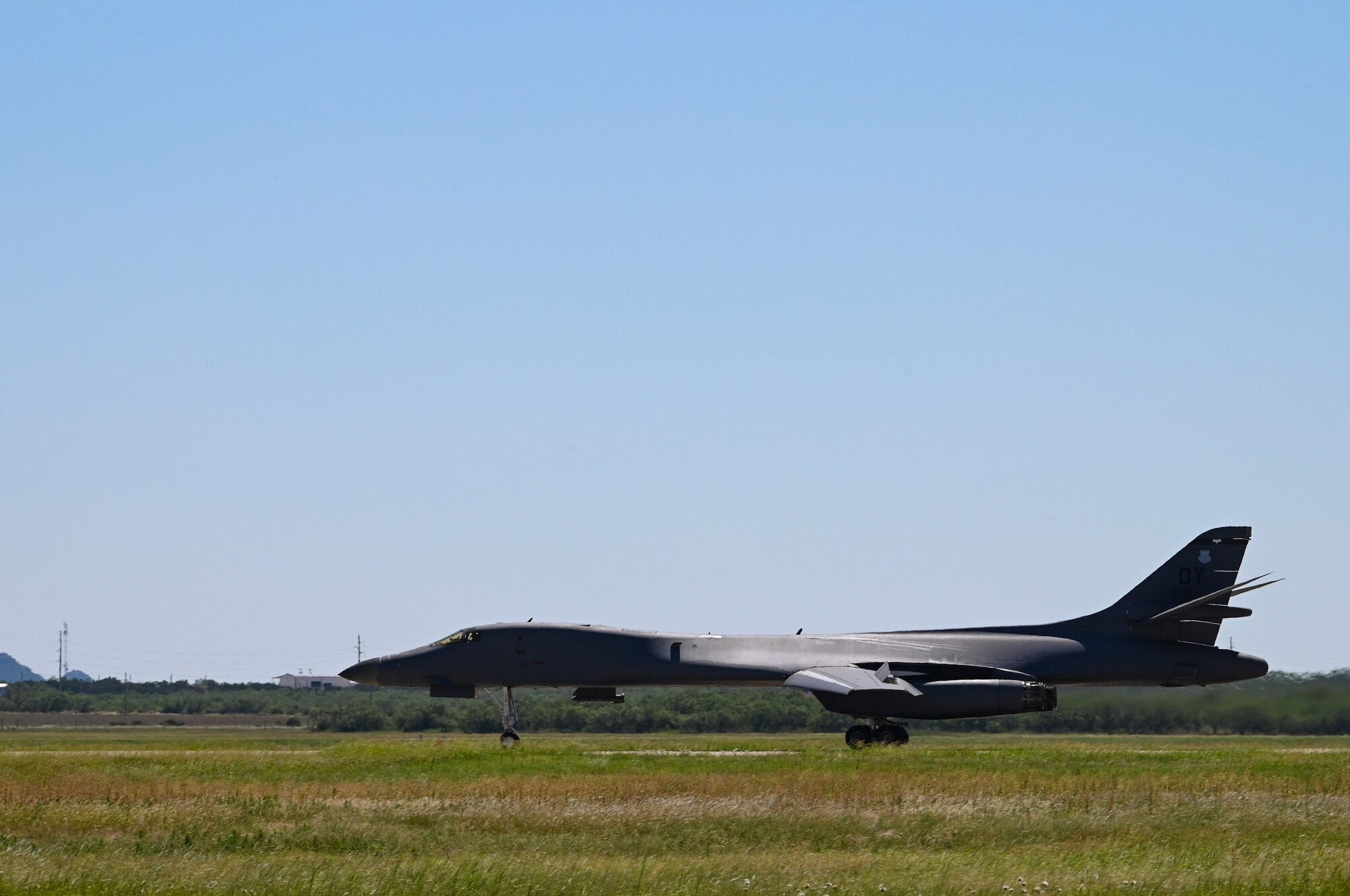 A B-1B Lancer taxis onto the flightline during a fini-flight for U.S. Air Force Col. Kevin Kippie, 7th Bomb Wing vice commander, at Dyess Air Force Base, Texas, June 29, 2023. Kippie served at Dyess from June 11, 2021, to June 16, 2023. While at Dyess, Kippie was committed to excellence as he fostered financial innovation and proposals for the installation, created a Wing Welcome Center for new Airmen and worked in integrated teams to action the wing’s fiscal efforts. (U.S. Air Force photo by Airman 1st Class Emma Anderson)