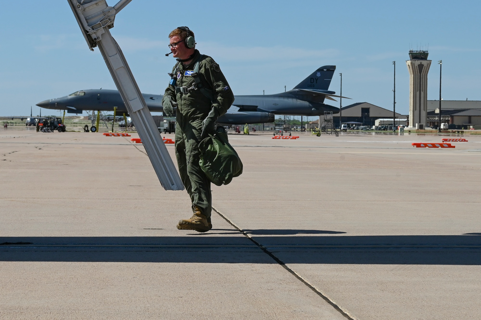 U.S. Air Force Col. Kevin Kippie, 7th Bomb Wing vice commander, exits a B-1B Lancer at Dyess Air Force Base, Texas, June 29, 2023. Kippie was committed to excellence as he fostered financial innovation and proposals for the installation, created a Wing Welcome Center for new Airmen and worked in integrated teams to action the wing’s fiscal efforts. (U.S. Air Force photo by Airman 1st Class Emma Anderson)