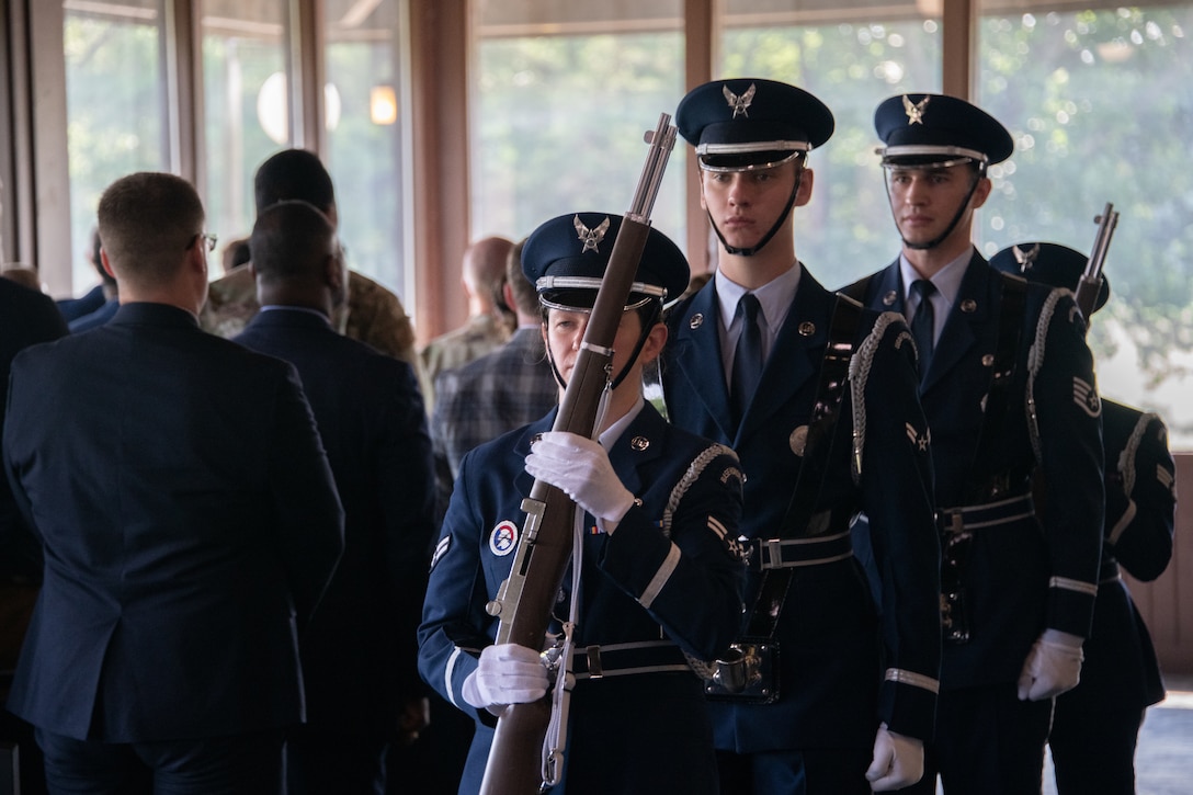 Members of the 316th Wing Honor Guard present the colors during the 7th Field Investigations Squadron change of command ceremony