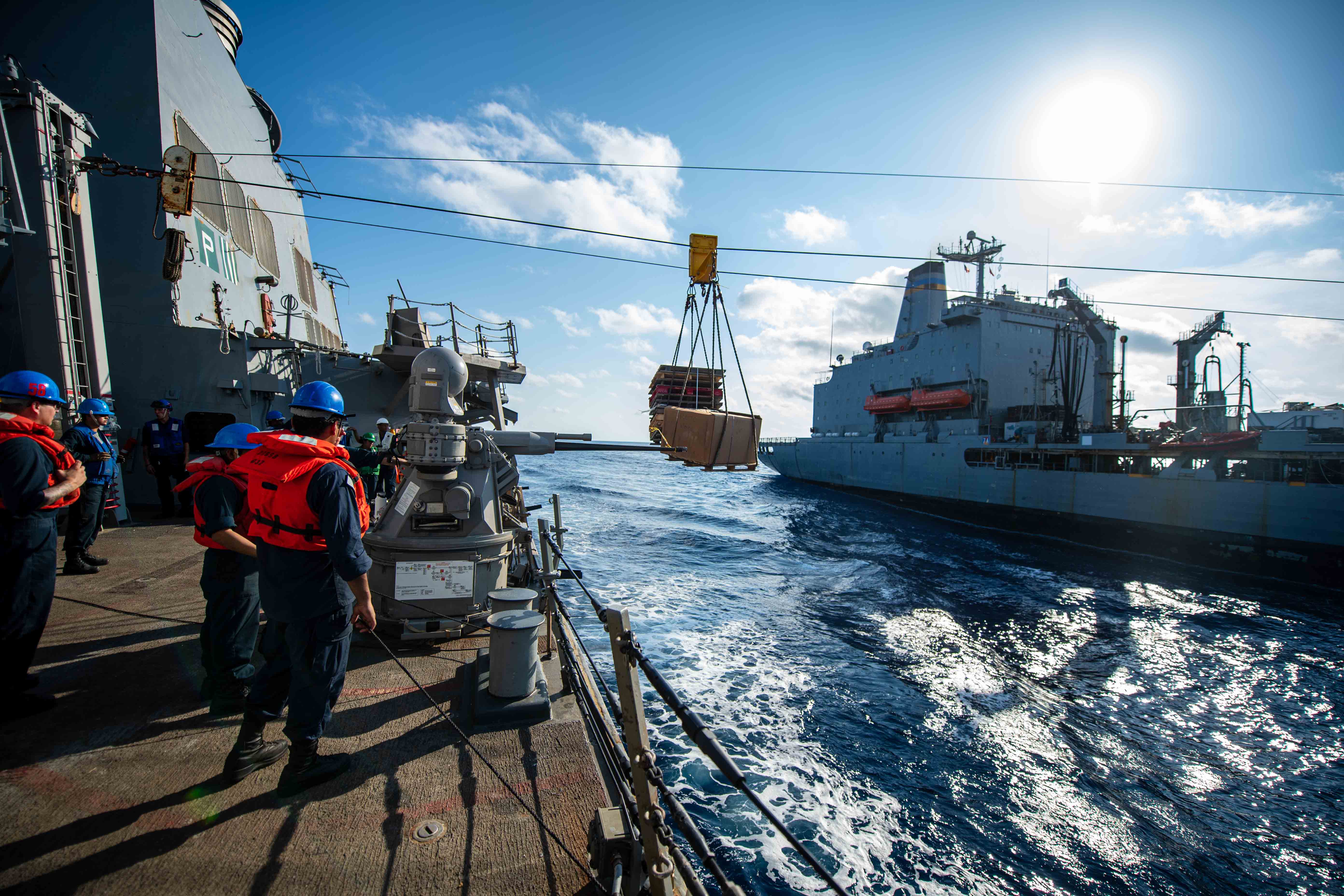 USS Laboon (DDG 58) receives supplies from USNS John Lenthall (T-AO 189) during a replenishment-at-sea in the Atlantic Ocean.