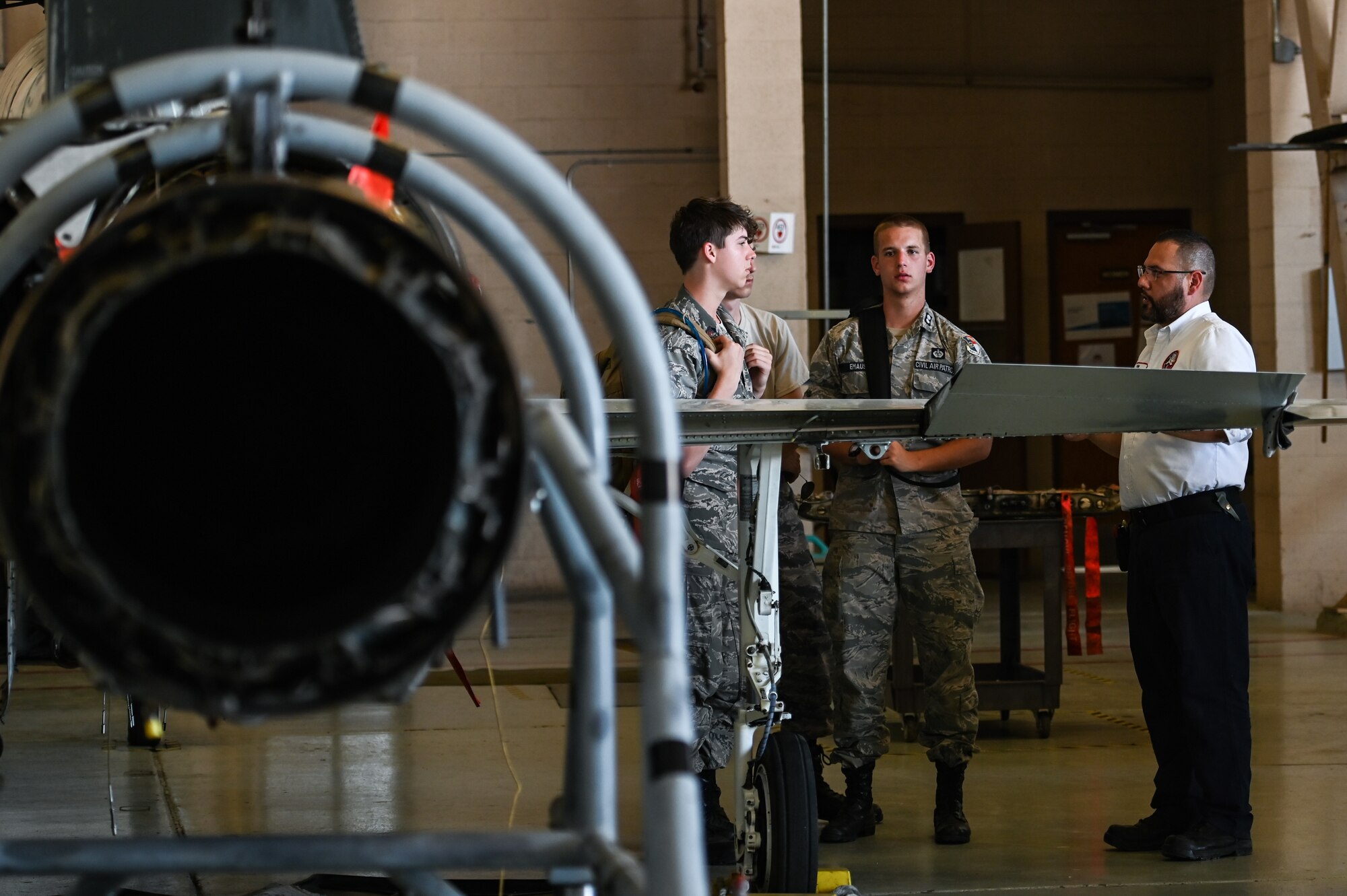 Civil Air Patrol cadets speak to a 47th Maintenance Directorate T-38 Talon maintainer at Laughlin Air Force Base, Texas, June 28, 2023.