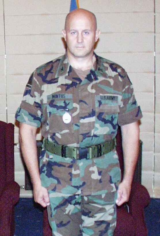Army Col. David Mintus stands in an Army uniform in a circa-2003 photo