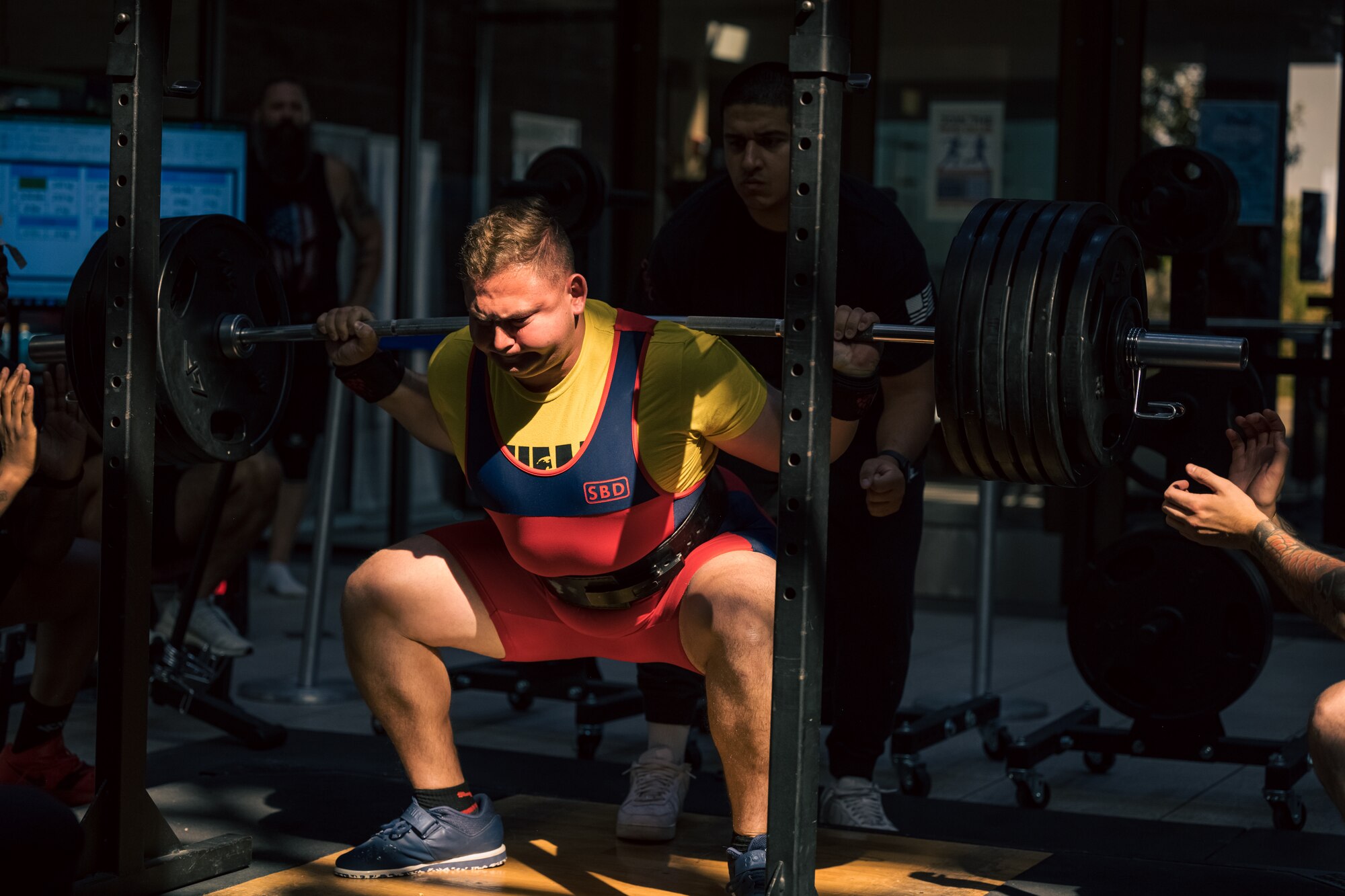 U.S. Air Force Tech Sgt. Forrest Emmal, 849th Aircraft Maintenance Squadron specialist flight chief, performs a back squat during a weightlifting meet at Holloman Air Force Base, New Mexico, July 8, 2023. Emmal earned the top male competitor award for the event. (U.S. Air Force photo by Senior Airman Antonio Salfran)