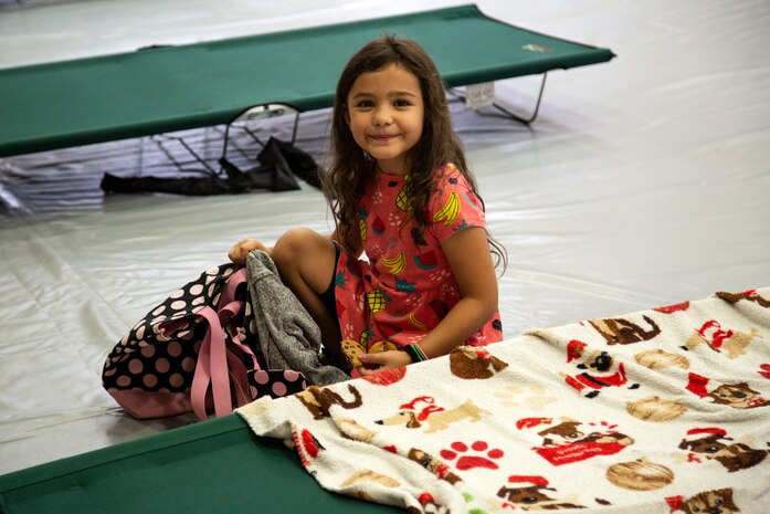 U.S. Marines, families, and local residents of Onslow county seek shelter in Wallace Creek Fitness Center, Marine Corps Base Camp Lejeune, Sept. 5, 2019. Marines worked to ensure all equipment and personnel are prepared for the upcoming heavy rains, strong winds and flash flooding that is associated with Hurricane Dorian. (U.S. Marine Corps by Cpl. Alexia Lythos)