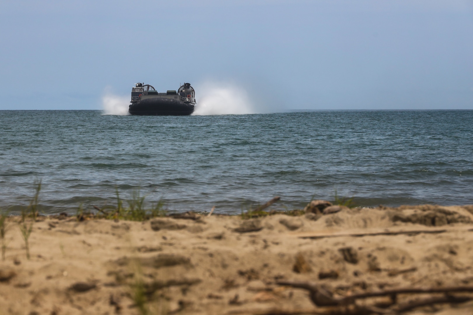 U.S. Navy Landing Craft Air Cushion (LCAC) 88 approaches a beach in Coveñas, Colombia, July 8, 2023, during a beach landing exercise for UNITAS LXIV.
