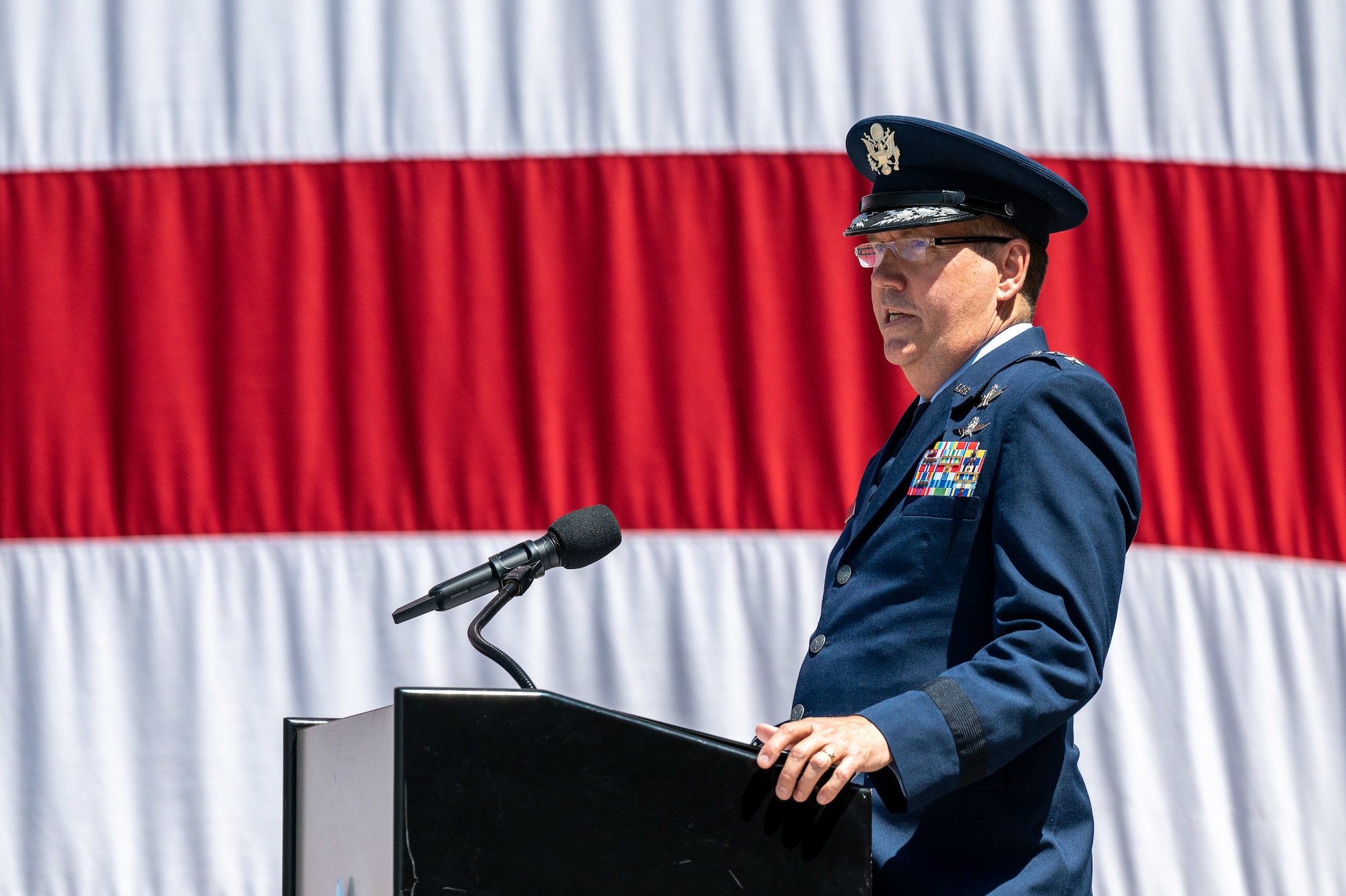 U.S. Air Force Maj. Gen. Shawn Bratton, Space Training and Readiness Command commander, delivers opening remarks during Delta 11’s change of command ceremony at Schriever Space Force Base, Colorado, July 7, 2023. Delta 11 is responsible for delivering realistic, threat-informed test and training resources to U.S. Space Force, joint, and coalition space operators via live, virtual, and constructive threat replication, leveraging the National Space Test and Training Complex across multiple space warfighting disciplines. (U.S. Space Force photo by Ethan Johnson)