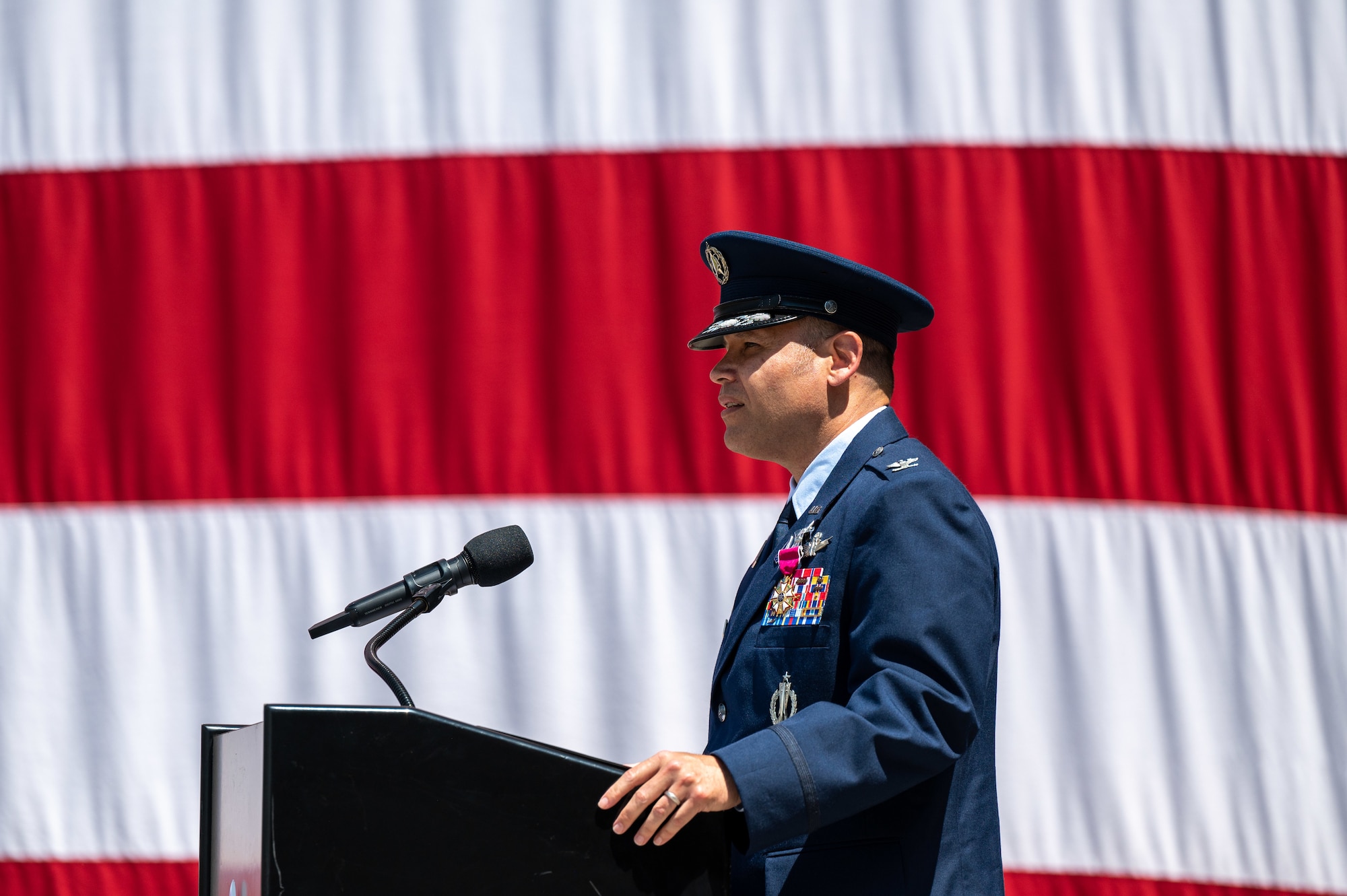 U.S. Space Force Col. Kyle Pumroy, the Delta 11 outgoing commander, delivers remarks during Delta 11’s change of command ceremony at Schriever Space Force Base, Colorado, July 7, 2023. Delta 11 is responsible for delivering realistic, threat-informed test and training resources to U.S. Space Force, joint, and coalition space operators via live, virtual, and constructive threat replication, leveraging the National Space Test and Training Complex across multiple space warfighting disciplines. (U.S. Space Force photo by Ethan Johnson)