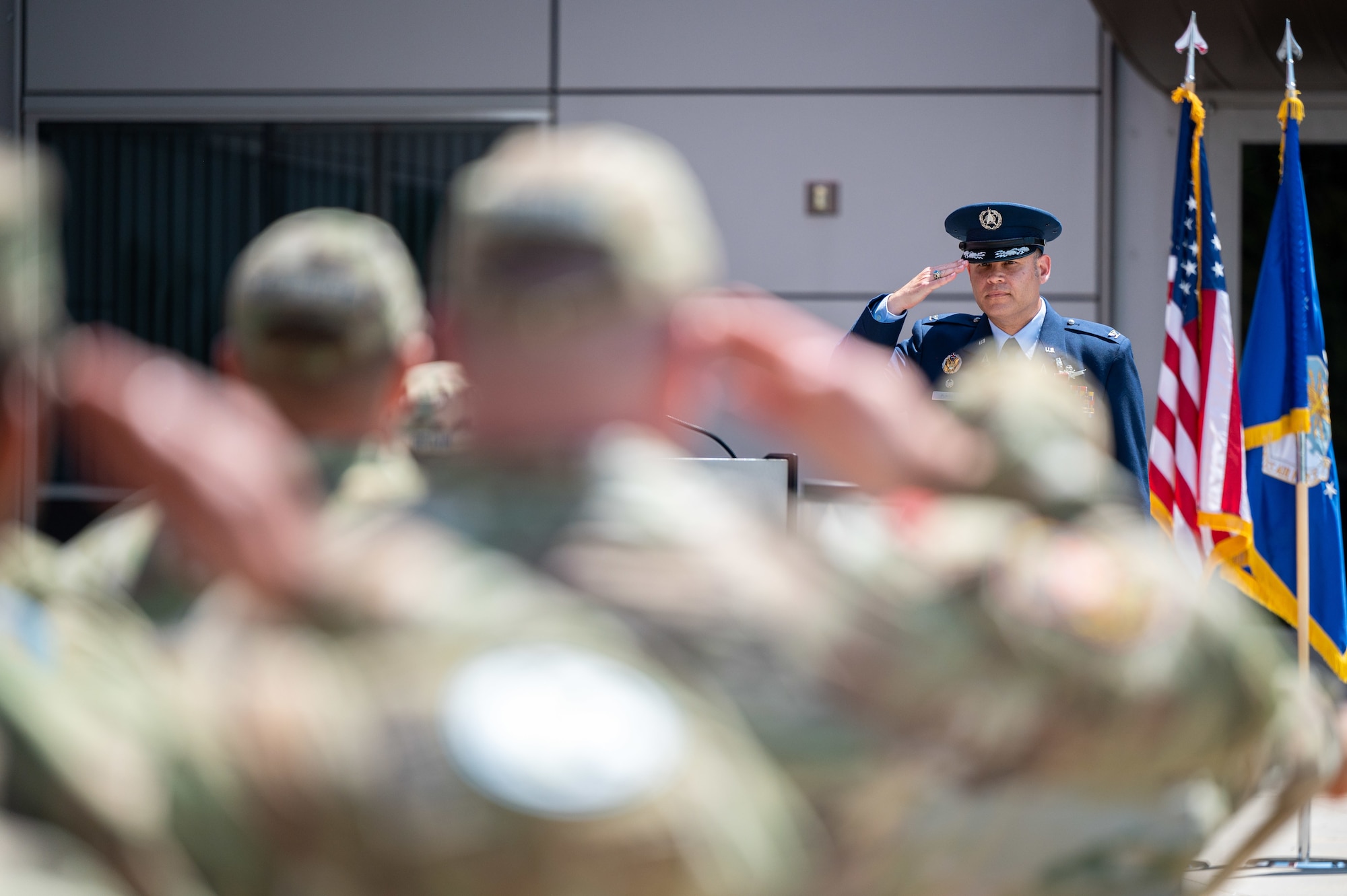 U.S. Space Force Col. Kyle Pumroy, the Delta 11 outgoing commander, renders a final salute to members of the Delta during a change of command ceremony at Schriever Space Force Base, Colorado, July 7, 2023. Delta 11 is responsible for delivering realistic, threat-informed test and training resources to U.S. Space Force, joint, and coalition space operators via live, virtual, and constructive threat replication, leveraging the National Space Test and Training Complex across multiple space warfighting disciplines. (U.S. Space Force photo by Ethan Johnson)