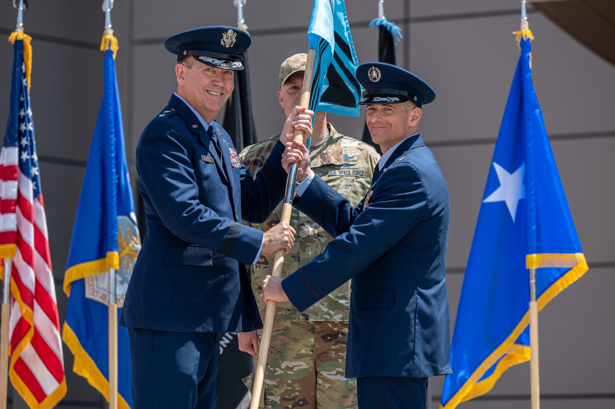 U.S. Space Force Col. Jay Steingold, the Delta 11 incoming commander, assumes command of Delta 11 during a change of command ceremony at Schriever Space Force Base, Colorado, July 7, 2023. Delta 11 is responsible for delivering realistic, threat-informed test and training resources to U.S. Space Force, joint, and coalition space operators via live, virtual, and constructive threat replication, leveraging the National Space Test and Training Complex across multiple space warfighting disciplines. (U.S. Space Force photo by Ethan Johnson)