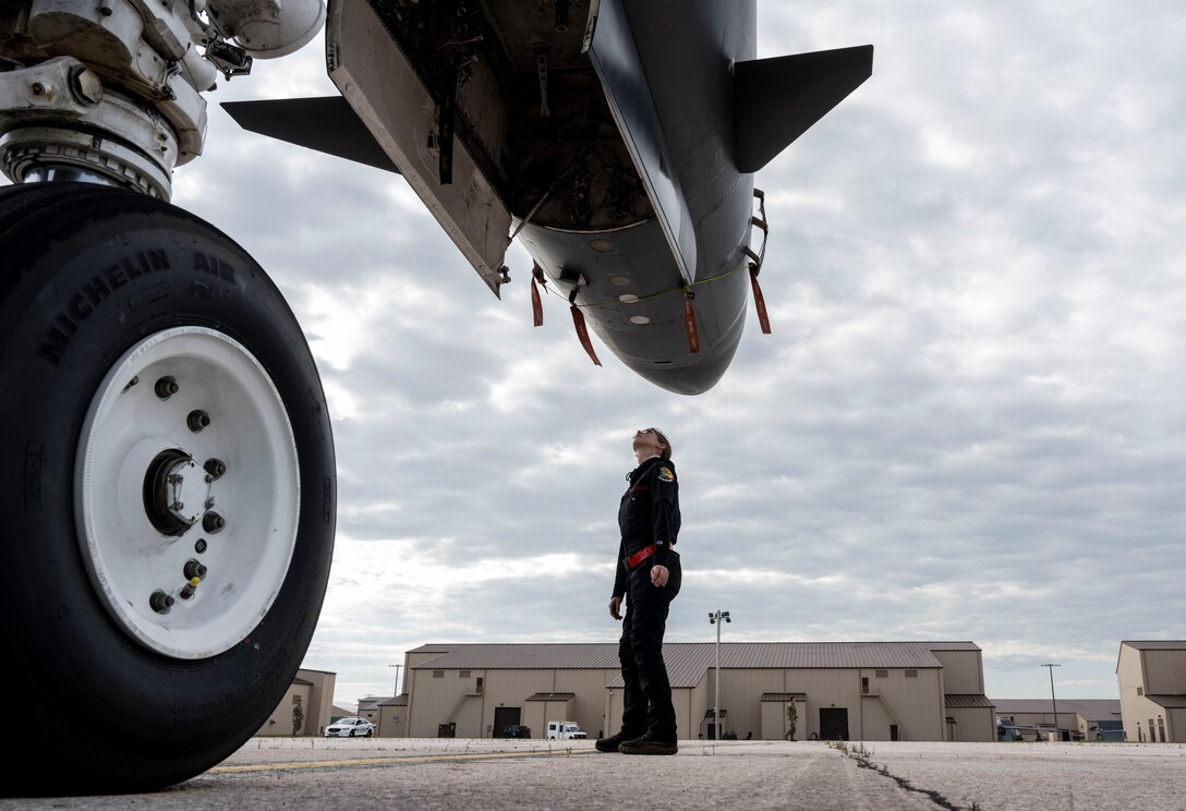 U.S. Air Force Senior Airman Emily Silcocks, 28th Aircraft Maintenance Squadron assistant dedicated crew chief, performs preflight inspections and safe for maintenance checks during the first annual Mission Generation Competition at Ellsworth Air Force Base, South Dakota, July 7, 2023.
