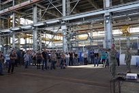 Pearl Harbor Naval Shipyard Commander Capt. Richard Jones, right, briefs shipyard personnel during a Town Hall held at the Structural Shop at Pearl Harbor Naval Shipyard.