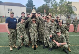 Information Warfare Training Command (IWTC) Monterey Commanding Officer, Cmdr. Matthew Dalton presented the Captain’s Cup trophy to the winning team at their annual competition at the Presidio of Monterey on June 15.