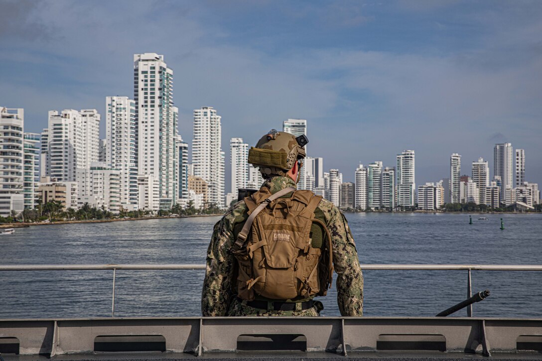 20230701-N-OK195-1013 
CARTAGENA, Colombia (July 1, 2023) Master-at-Arms 3rd Class Cole Steagall, assigned to the expeditionary fast transport USNS Burlington (T-EFP 10), stands security forces watch as the ship arrives in Cartagena, Colombia in preparation for UNITAS LXIV, July 1, 2023. Burlington is one of 26 vessels slated to participate in UNITAS LXIV, the world’s longest running maritime exercise, July 11-21. Colombia is hosting UNITAS LXIV this year with nearly 7,000 people from 20 nations. (U.S. Navy photo by Lt.j.g. Nicko West/Released)